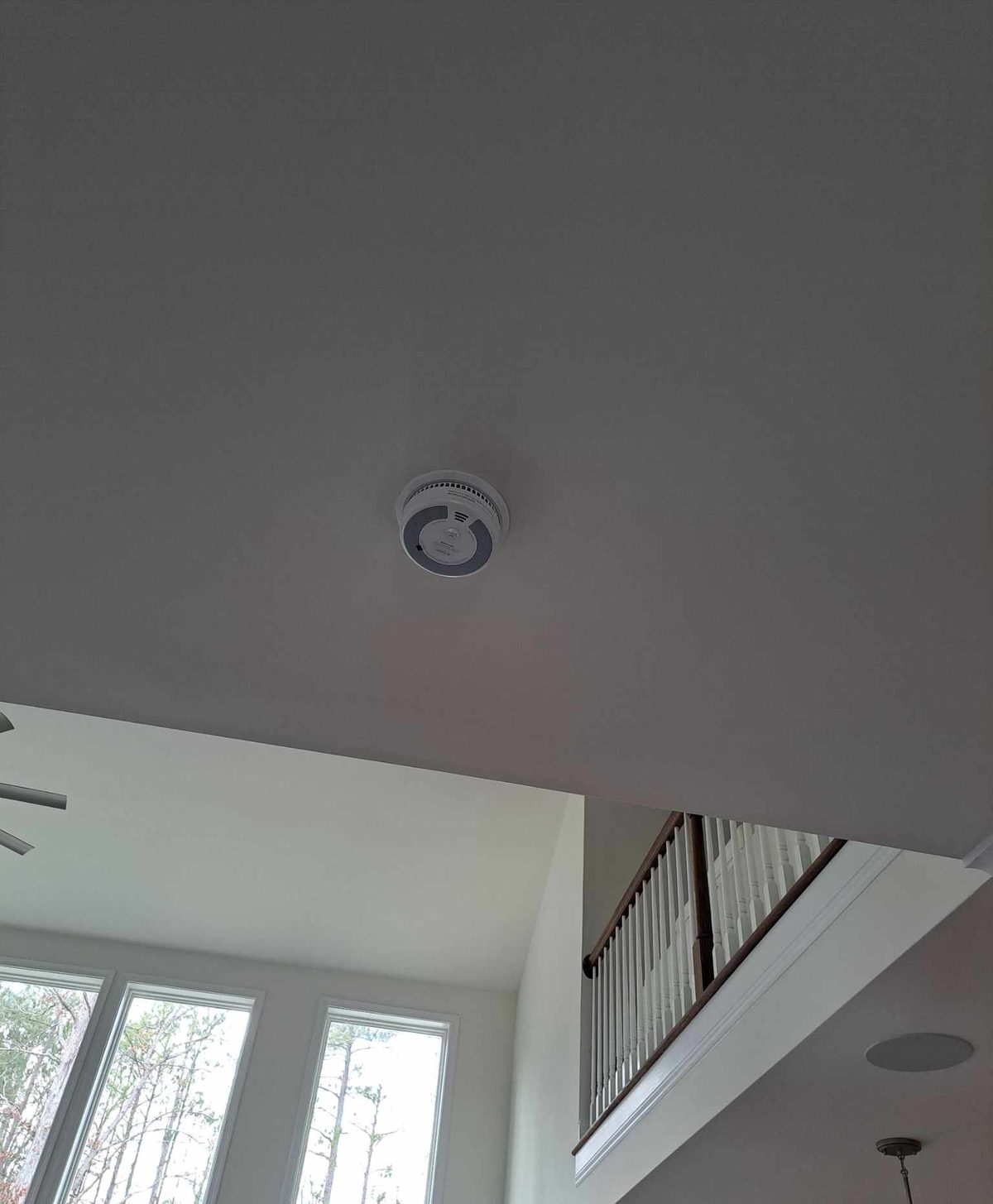 Smoke detector installed on a ceiling