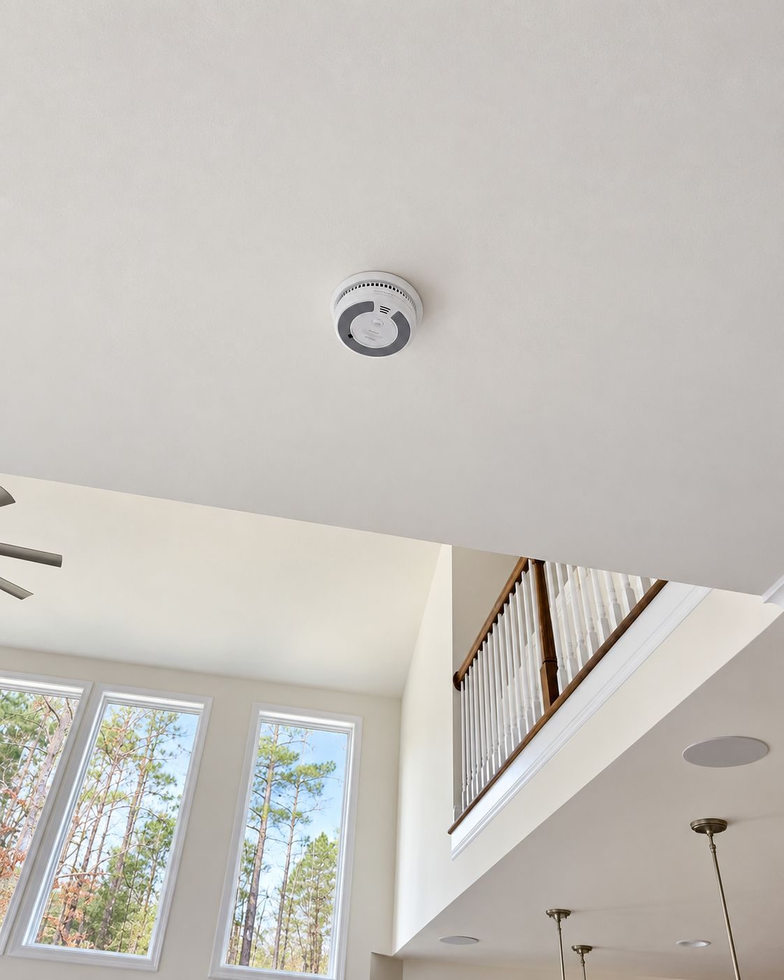 Smoke detector installed on a high ceiling